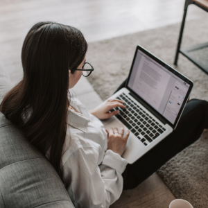 Woman working on laptop at home